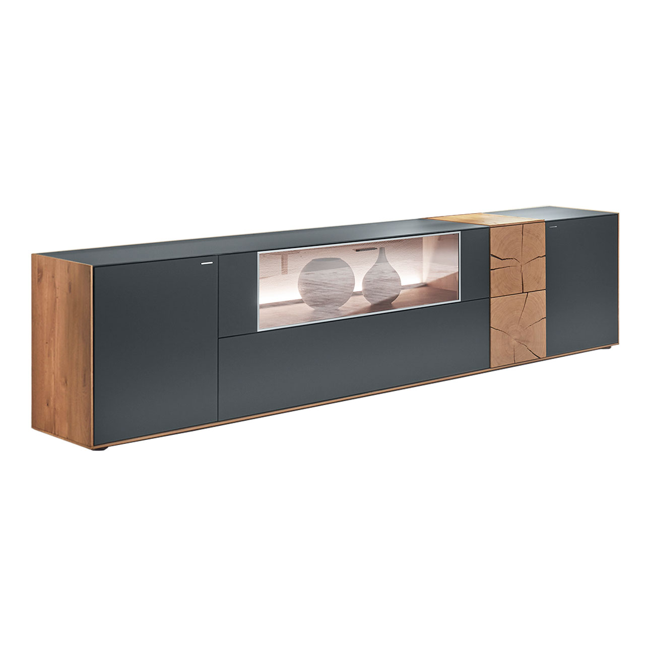 Hartmann CAYA - Lowboard 7170-3232A Modernes Lowboard aus massiver Kerneiche Umato mit Mattglas anthrazit Front, mittig mit Glasklappe, rechts mit dekorativer Hirnholz Applikation aus zwei rechteckigen Hirnholzscheiben.