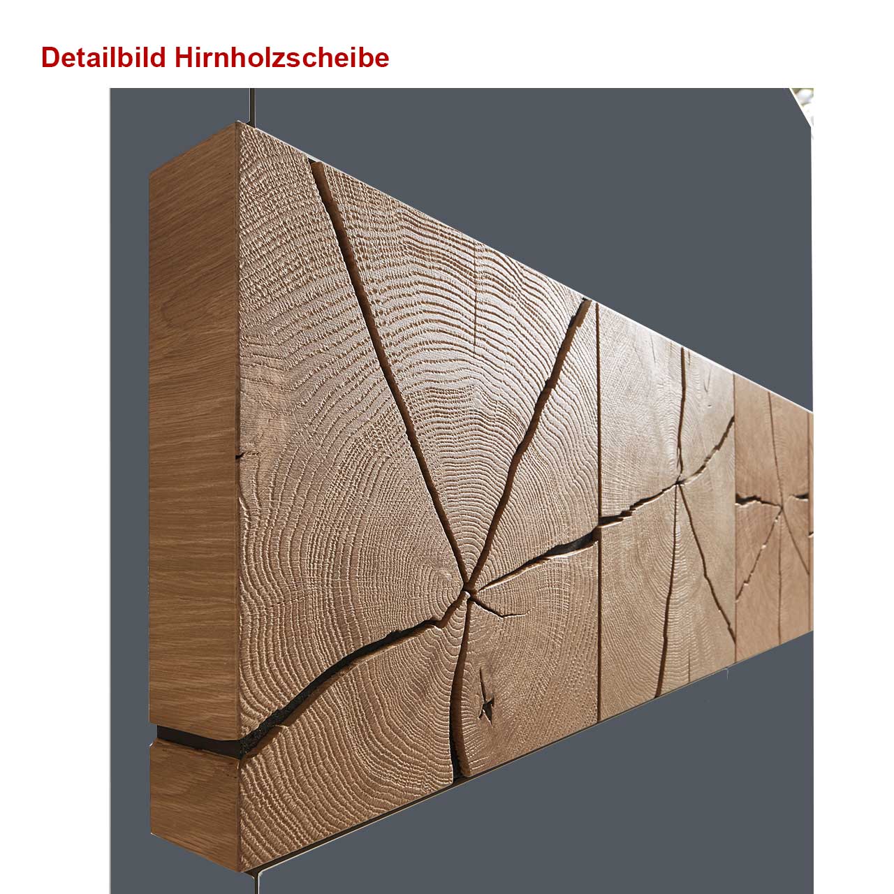 Detailbild dreier rechteckiger Hirnholzscheiben mit sichtbarer Holzmaserung und charakteristischen Holzrissen. Mit Hinweistext: Detailbild Hirnholzscheibe