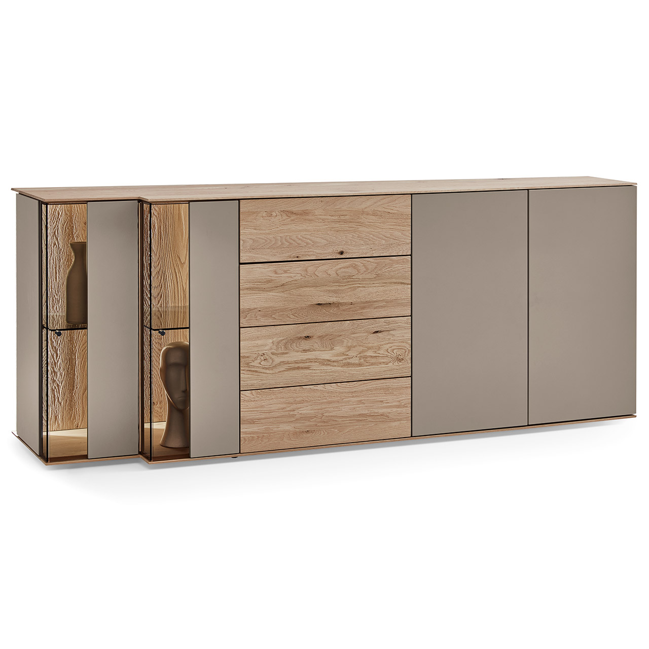 Hartmann SVEA - Sideboard re. schräg 8660-4202 Moderne Kommode aus Kerneiche Massivholz mit Lackfronten in Sand und edlem Riffholz. Mit zwei Lacktüren rechts, einem Schubkasten und Tür in Riffholz mittig und zwei Glas-Lacktüren in asymmetrischem Design und beleuchteter Riffholzrückwand links.