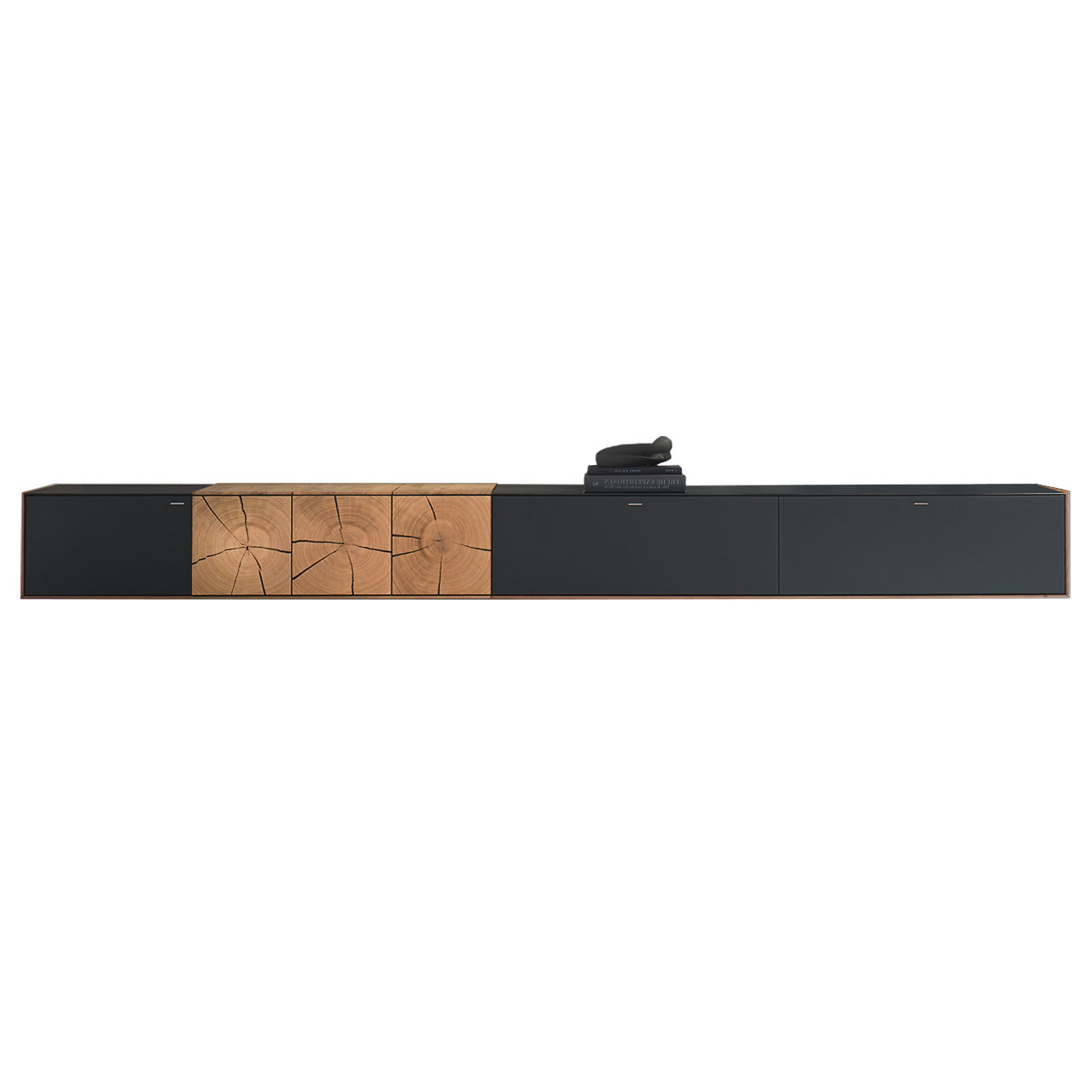 Hartmann CAYA - Hängelowboard 7170-1302A Modernes, längliches Hängelowboard aus massiver Kerneiche mit Mattglas anthrazit Front und dekorativer Hirnholz Applikation aus drei rechteckigen Hirnholzscheiben links.