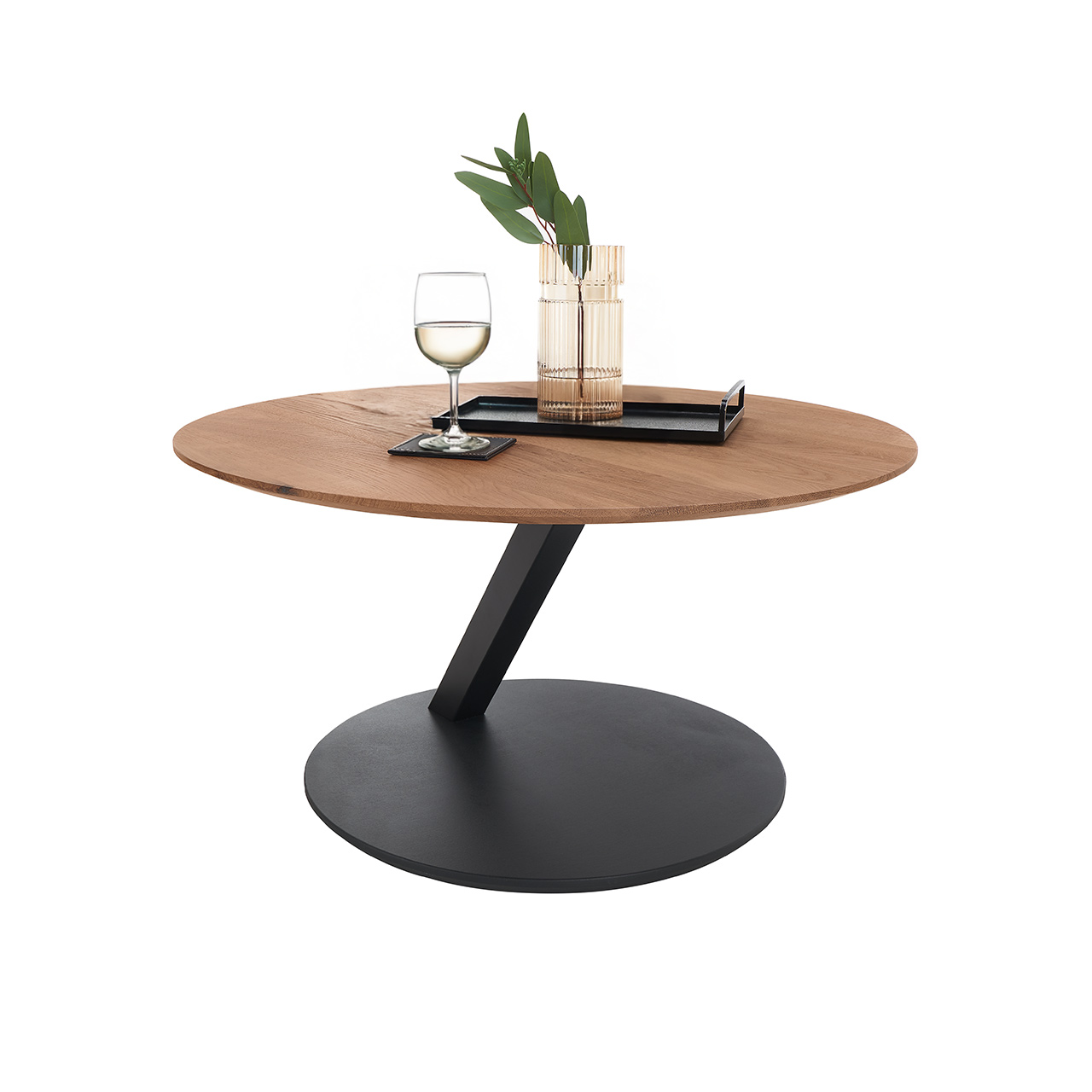 Hartmann Möbel SVEA - Couchtisch 8660-1447 - Kerneiche Natur / Metall anthrazit Moderner Couchtisch mit runder, höhenverstellbarer Holzplatte in Kerneiche Natur. Schrägverlaufende Metallsäule und runde Bodenplatte in Holz anthrazit.