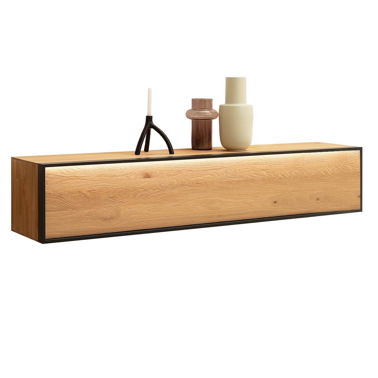 Hartmann YOLA Schöner Wohnen - Hängelowboard 8590-2203 Schlichtes Hängelowboard aus sandgestrahlter Kerneiche Natur eingefasst in einen anthrazitfarbenen Metallrahmen, der im oberen Bereich beleuchtet ist.