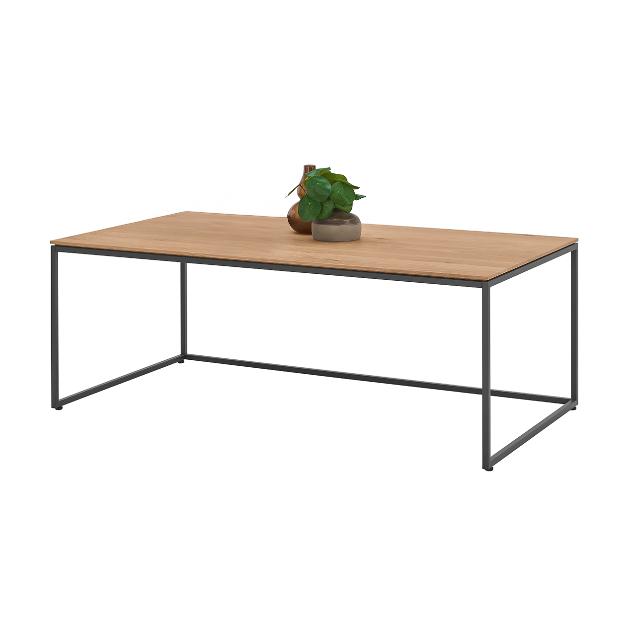 Moderner Couchtisch mit rechteckiger Holztischplatte in Kerneiche Natur und filigranem Metallgestell in Anthrazit - In Seitenansicht.