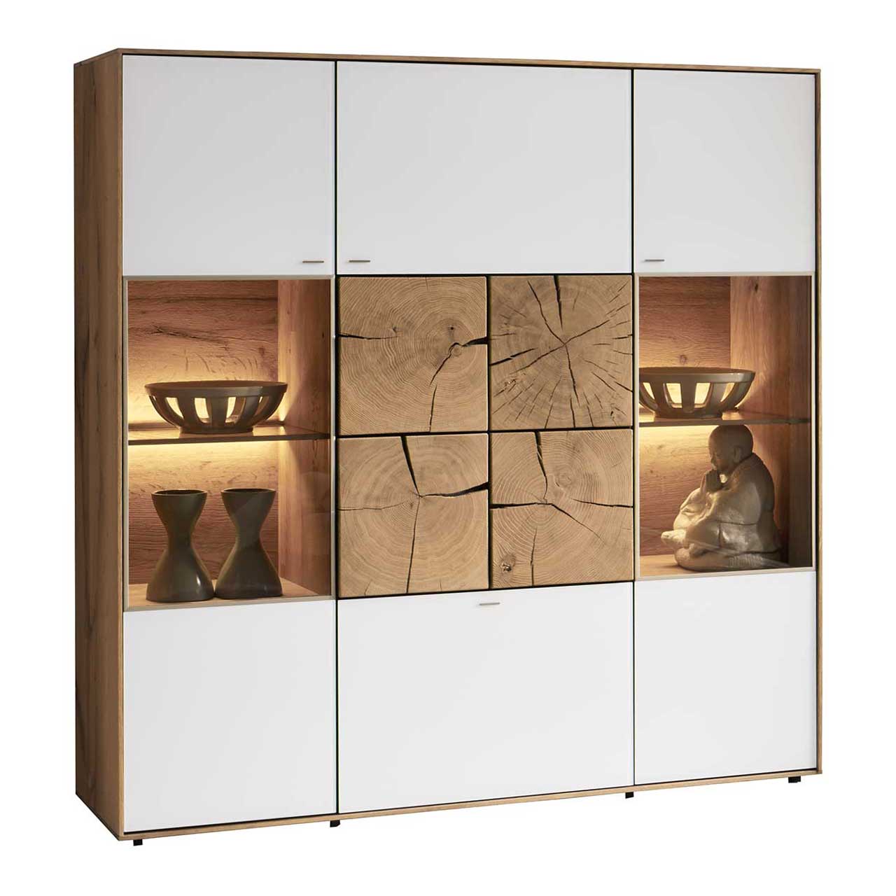 Hartmann CAYA - Highboard 7170-7138W Modernes Highboard aus massiver Kerneiche Umato mit Mattglas weiß Fronten, rechts und links mit beleuchtetem Glasausschnitt, mittig mit vier dekorativen, rechteckigen Hirnholzscheiben in heller Kerneiche Umato.