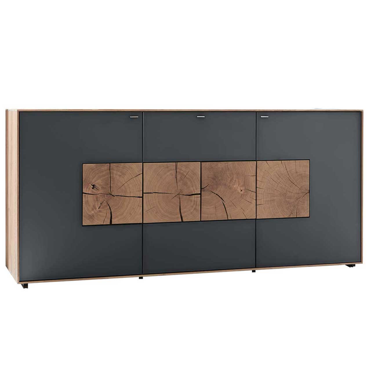 Hartmann CAYA - Sideboard 7170-4173A Modernes Sideboard aus massiver Kerneiche Umato mit anthrazitfarbenen Mattglasfronten und vier dekorativen, rechteckigen Hirnholzscheiben.