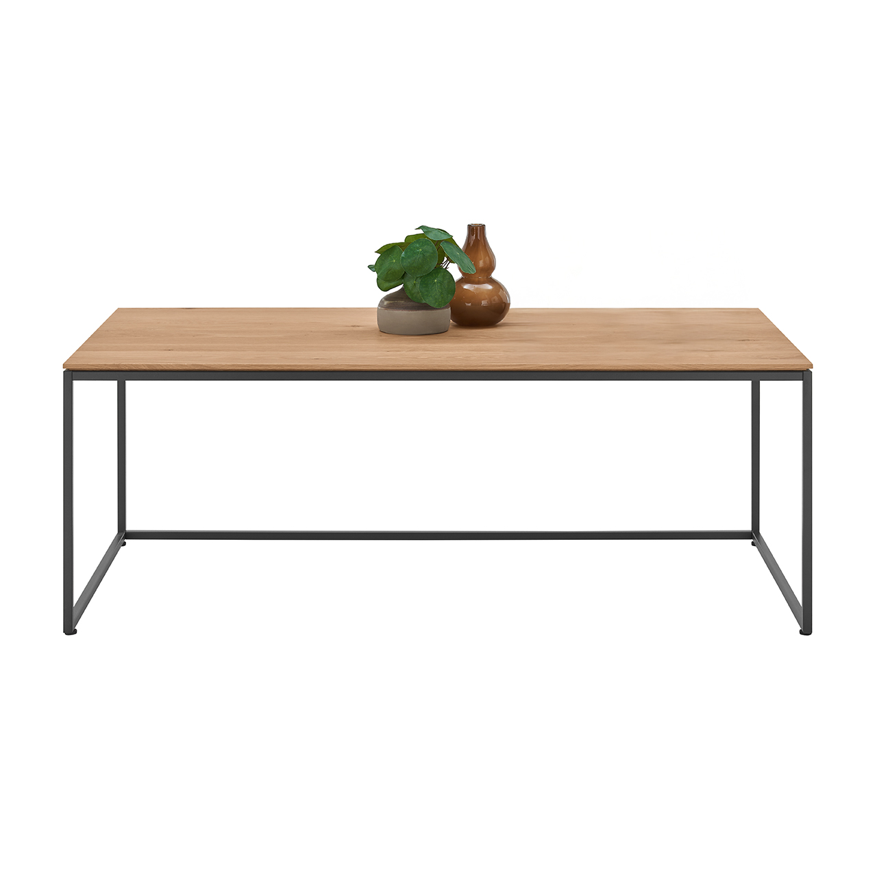 Hartmann Möbel SVEA - Couchtisch 8660-1421 - Kerneiche Natur / Metall anthrazit Moderner Couchtisch mit rechteckiger Holztischplatte in Kerneiche Natur und filigranem Metallgestell in Anthrazit - In Frontansicht.