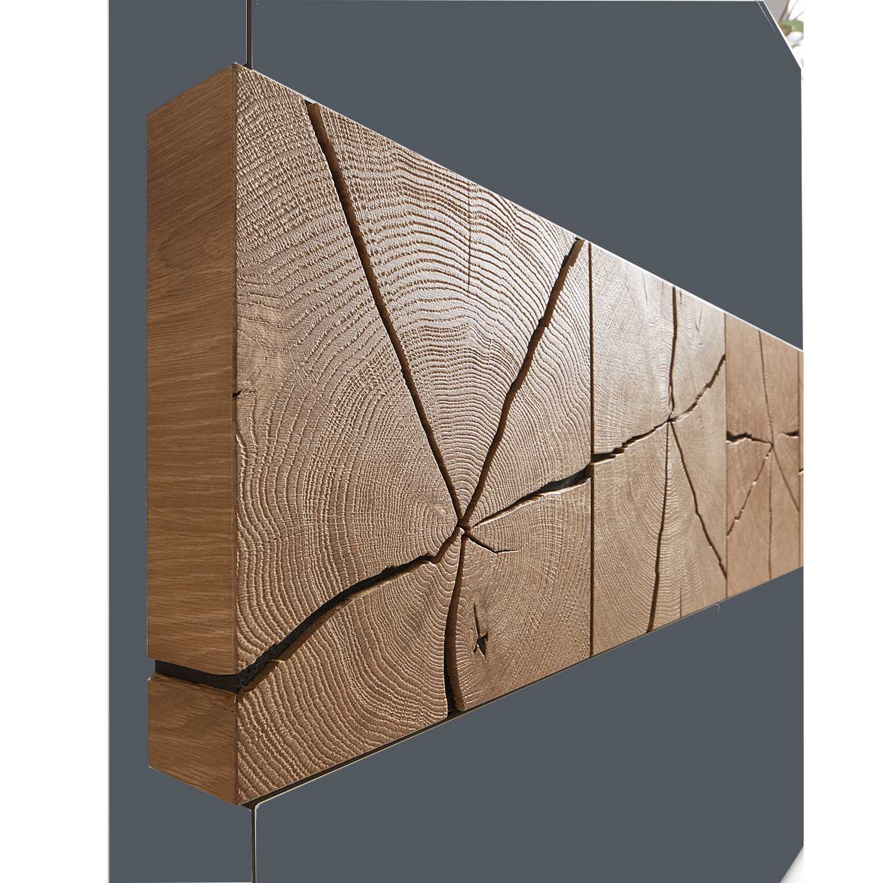 Detailbild dreier rechteckiger Hirnholzscheiben mit sichtbarer Holzmaserung und charakteristischen Holzrissen.