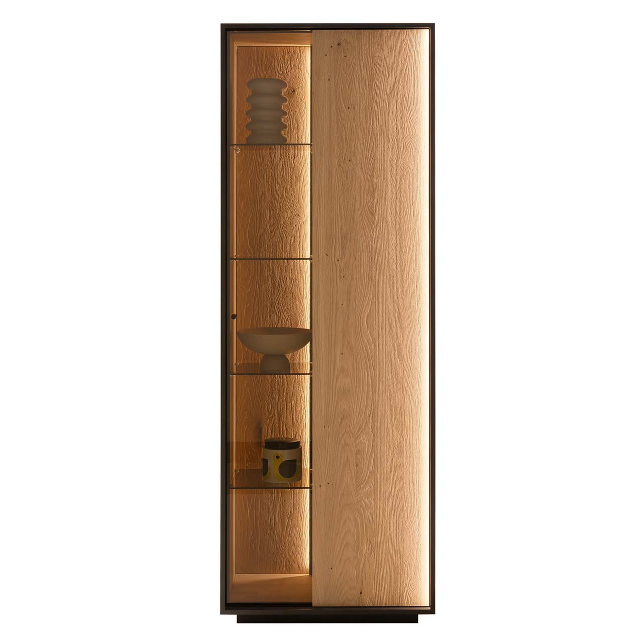 Hartmann YOLA Schöner Wohnen - Standvitrine mit Sockel 8590-0076 - Türanschlag rechts Standvitrine mit Sockel im modernen Design aus sandgestrahlter Kerneiche Natur, eingefasst in einen Metallrahmen in Anthrazit, mit geteilter Tür: links beleuchteter Glasausschnitt mit vier Glaseinlegeböden, rechts Holz